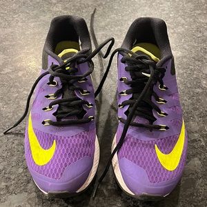 Purple-green neon Nike sneakers